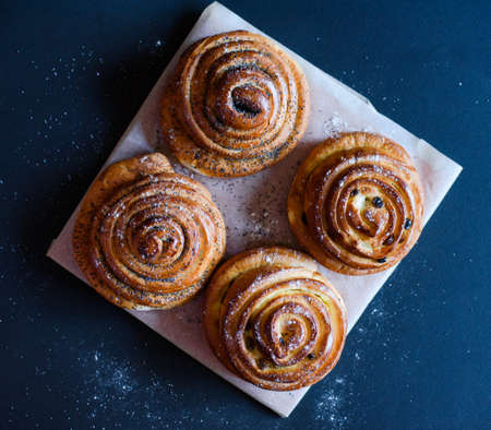 Delicious cinnabon buns. Buns with poppy seeds and raisins. Rouge bakingの写真素材