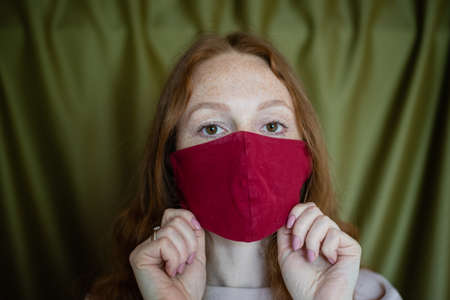 girl has a protective mask on her faceの写真素材