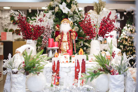 Christmas decor with santa claus and snow covered branchesのeditorial素材