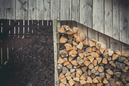 old and new firewood near. wood textureの写真素材