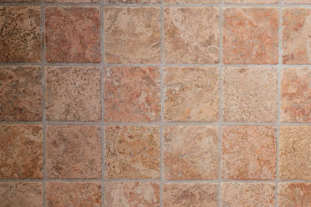 brick color square tile pattern close-up