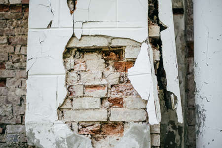 Wall with old red bricks. Textured backgroundの写真素材