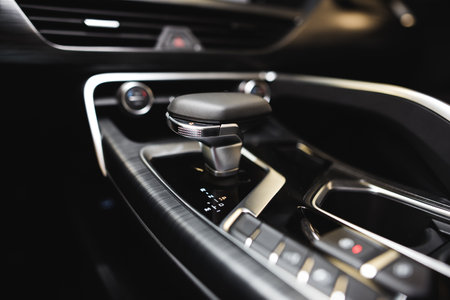 Detail of modern car interior, gear stick, automatic transmission in expensive car. High quality photoの写真素材