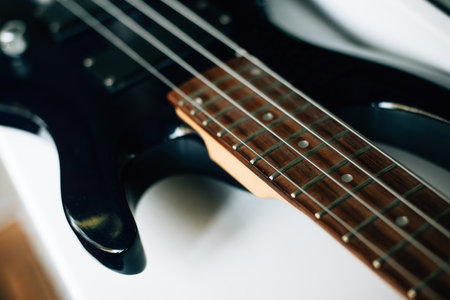 electric black guitar neck close upの写真素材
