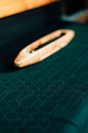 Weaving shuttle on the warp. High quality photoの写真素材