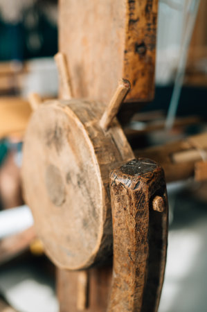 antique spinning wheel close up. High quality photo