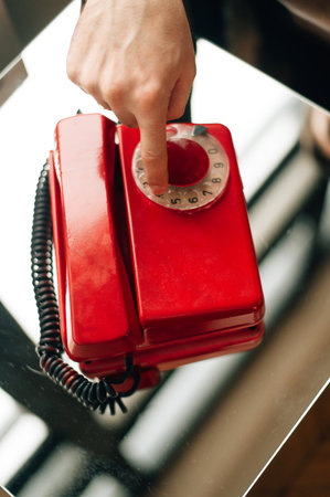 red retro phone with buttons. High quality photoの写真素材