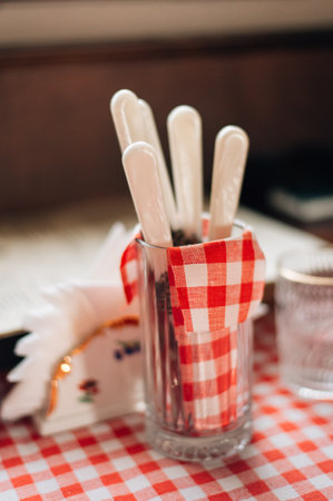 cutlery in a glass with napkins. High quality photoの写真素材