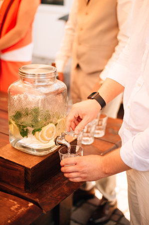 Refreshing ice drink with lemon, lime and mint. Infusion of lemonade with citrus. Citrus lemonade - health and beauty benefits. Best drink in hot summer. High quality photoの写真素材