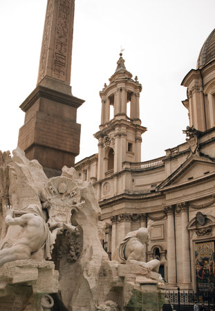 Sculpture of a man on a fountain in Rome. High quality photoの写真素材