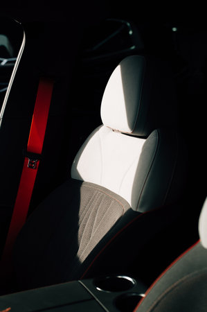 Passenger seats in a car with red seat belts. High quality photoの写真素材