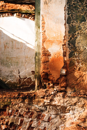 Walls of a ruined and abandoned brick building. Ruins of an old house. High quality photoの写真素材