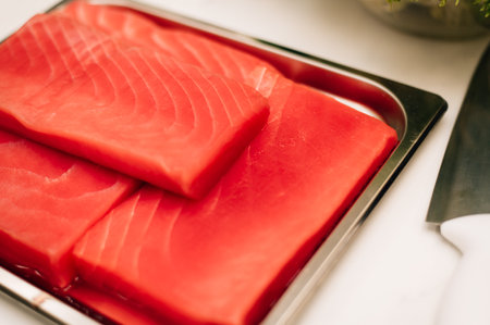 Large chunks of raw fish on a plate. High quality photoの写真素材