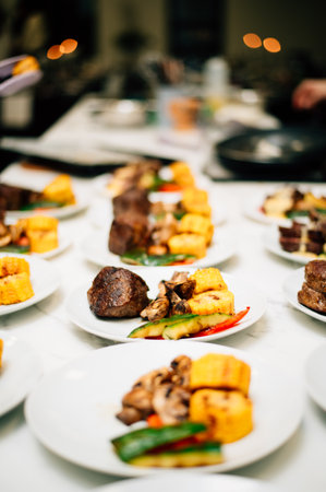 Grilled vegetables on a white plate in portions. High quality photoの写真素材