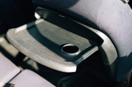 table with cup holders in a train carriage during the day. High quality photoの写真素材