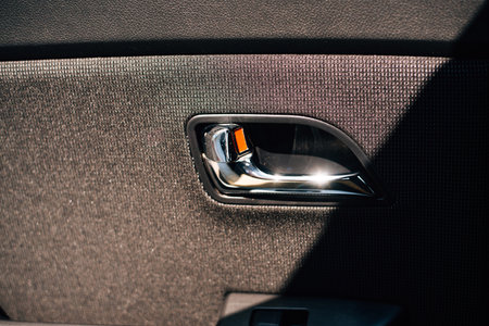 Interior door handle in a car. High quality photo
