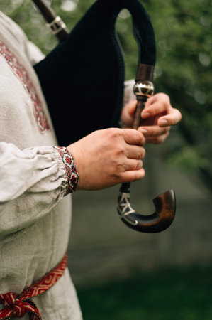 bagpipe player in national costume with bagpipes. High quality photoの写真素材