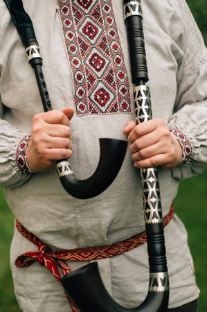 bagpipe player in national costume with bagpipes. High quality photoの写真素材