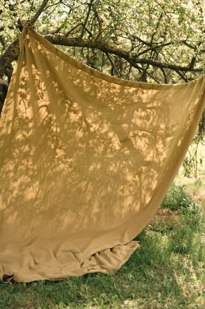 Linen backdrop for a photo shoot in the garden. High quality photoの写真素材