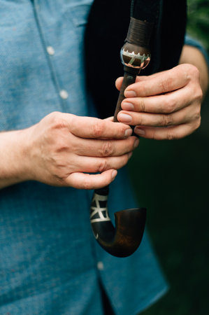 Hands of a bagpiper playing the bagpipes. High quality photoの写真素材