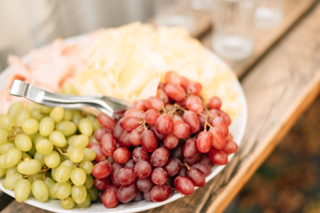 Different varieties of grapes on a plateの写真素材