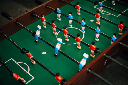 One of the games played during office birthdays is table footballの写真素材