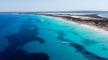 Aerial view of the beaches of Ses Illetes on the island of Formentera in the Balearic Islands, Spain...