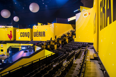 Paris, France - October 7, 2021: Yellow bleachers at the Bpifrance Innovation Generation (BIG) business convention for investors and entrepreneurs at the Accor Arena in Paris Bercy Arenaのeditorial素材