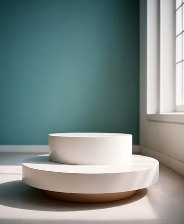 A white round stand for product display positioned against a turquoise wall backdrop, creating a striking contrast that enhances the visibility of showcased items. This setup is perfect for retail environments, exhibitions, and photography, adding a vibrant and modern aesthetic.の素材