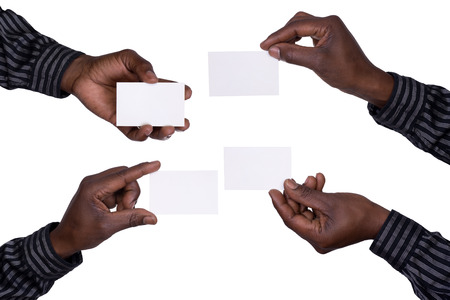 Hands holding cards