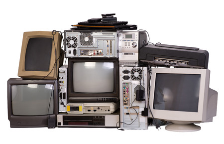 Old, used and obsolete electronic equipment isolated on whiteの写真素材