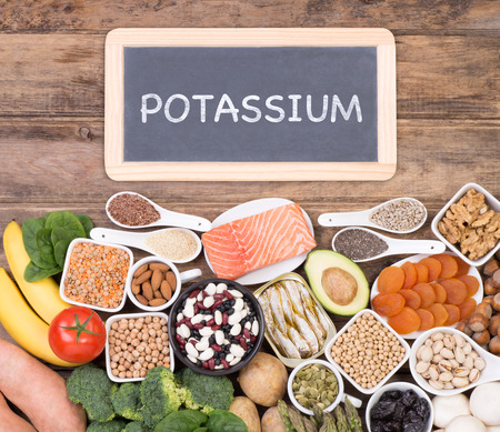 Various potassium food sources such as grains, fruit and  vegetables, top viewの写真素材