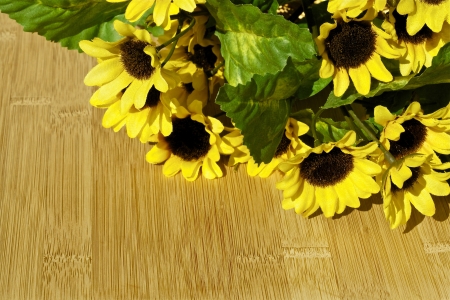 Spring flowers on a wooden backgroundの写真素材