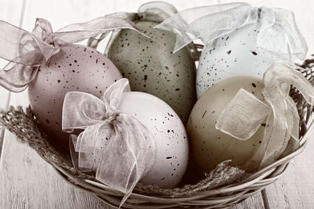Easter eggs on a basket,vintage stile