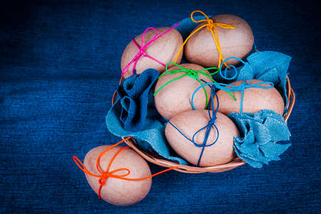 Easter eggs in a basket,decoration.の写真素材