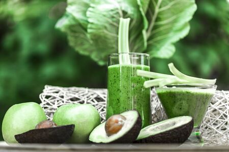Healthy green smoothie with fresh fruit and vegetables.の写真素材