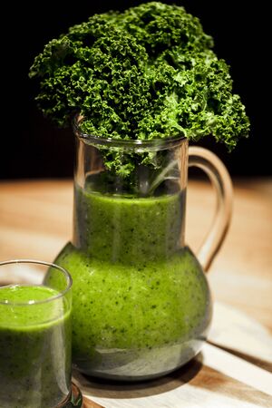 Green smoothie with healthy kale leaves.の写真素材