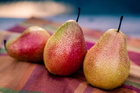 Three organic ripe pears.