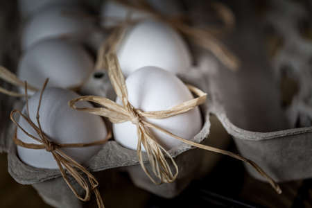 White eggs in a container, selective focus image.の写真素材