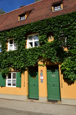 Augsburg, Germany - The historical FUGGEREI - the first social housing district of the 16th centuryのeditorial素材