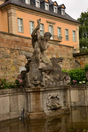 Sculpture on the fountain in the Old Town of Bonn, Germanyの写真素材