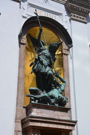 Statue of an angel on the facade of a building in Vienna, Austriaの写真素材