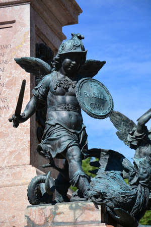 Statue of an angel with a sword and shield in the center of Rome, Italyの写真素材