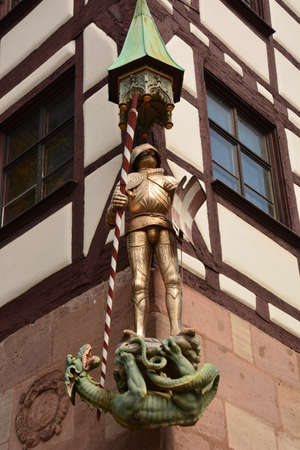 Sculpture on the facade of the old town hall in Heidelberg, Germanyの写真素材