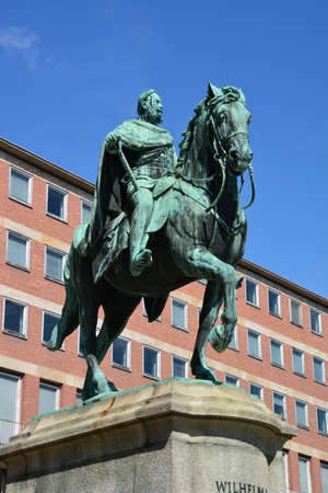 Statue of a man riding a horse.の写真素材