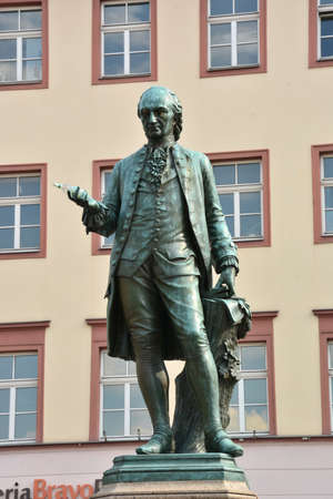 Statue of the famous poet and writer in Krakowの写真素材