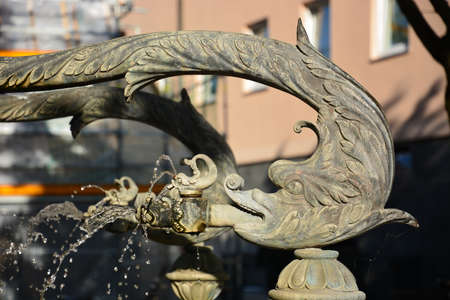 Fountain in the city center of Krakow, Poland.の写真素材