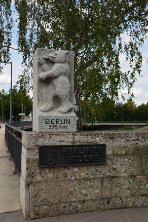 A monument with a sculpture on it.の写真素材