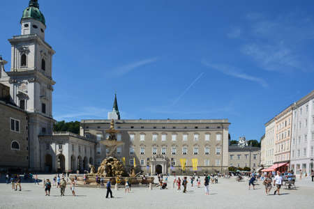 Tourists on the main square of Salzburgの写真素材