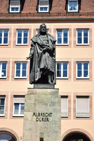 Statue of Albrecht Dürer in the Old Town of Frankfurt, Germanyの写真素材
